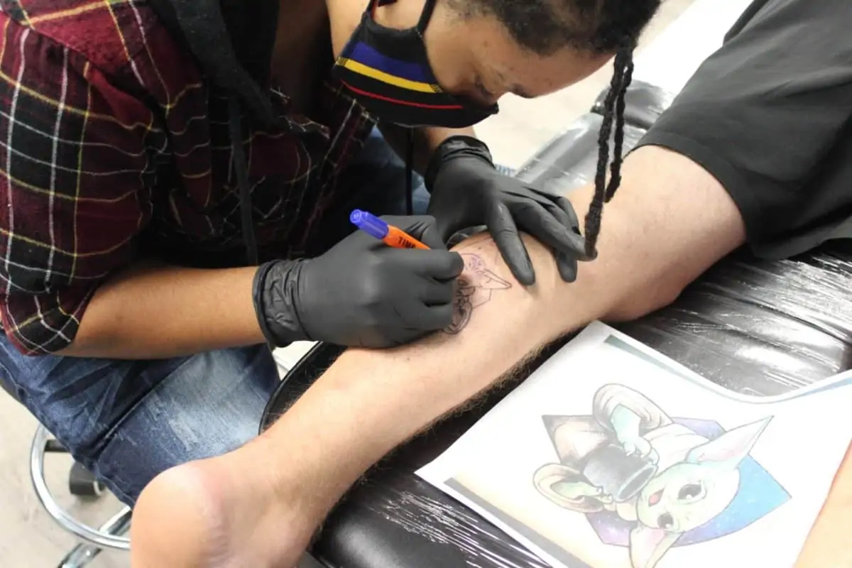 tattoo artist baby yoda