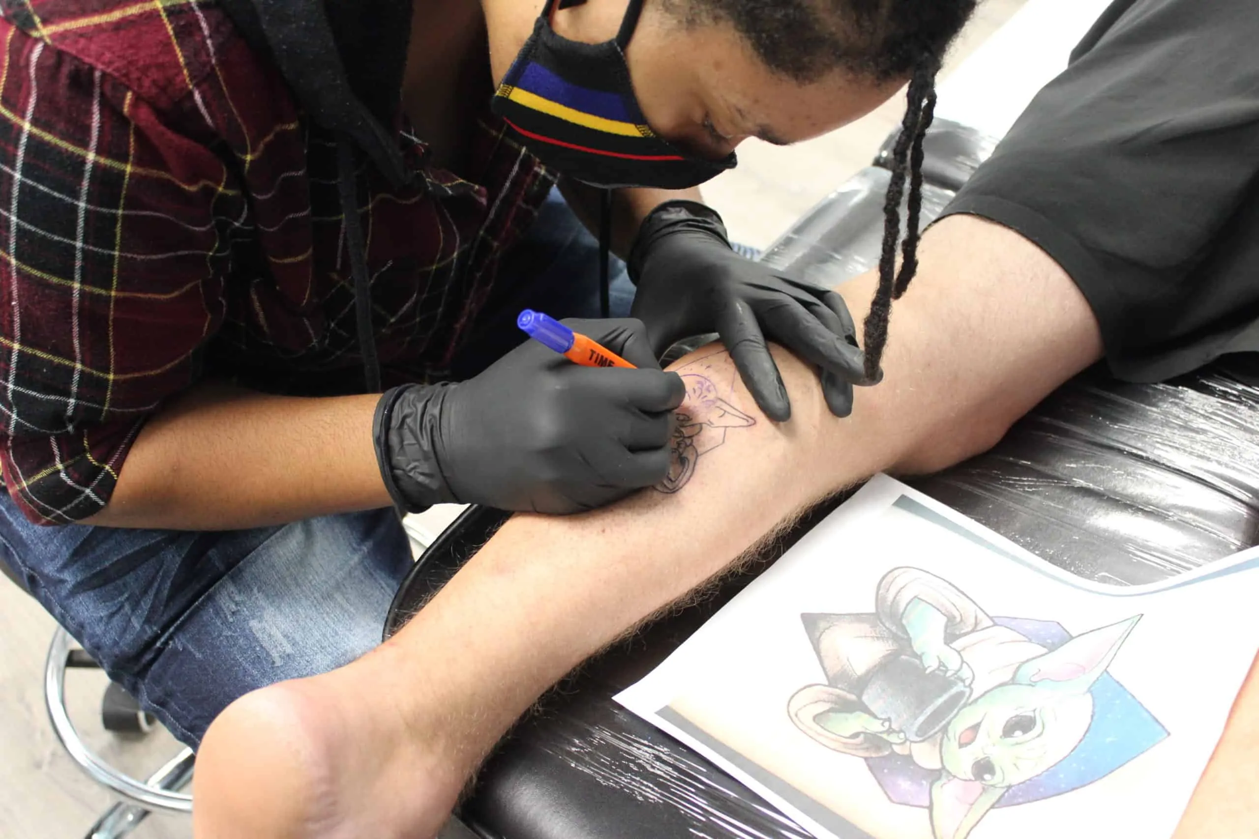 tattoo artist baby yoda