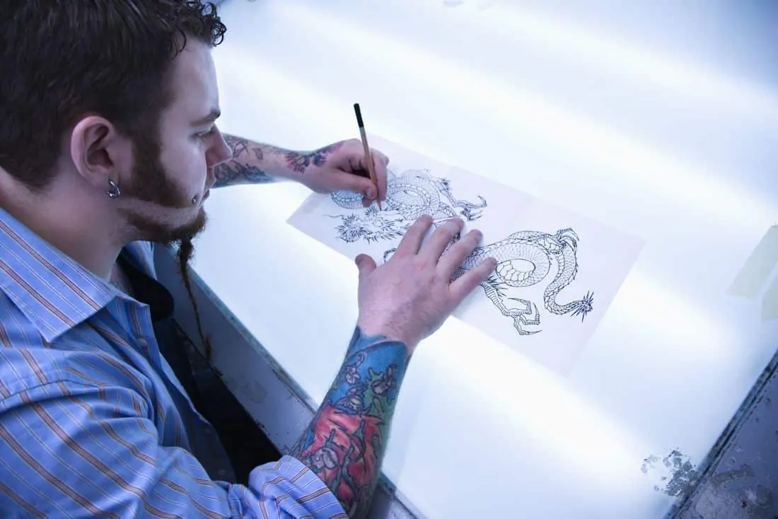 tattoo artist drawing