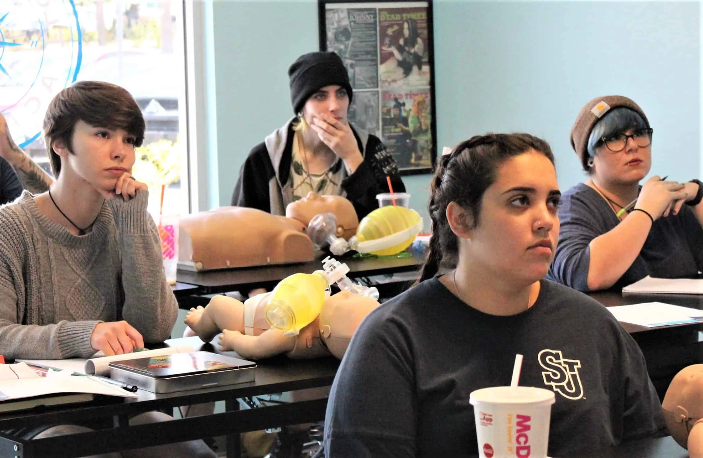 tattoo students learning cpr